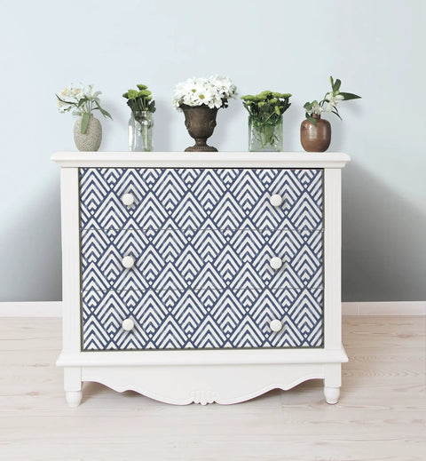 White drawer with Arrowhead Deep Peel And Stick Wallpaper In Blue For Totally Easy DIY Decor, removable geometric pattern.