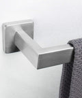 Close-up of brushed nickel towel bar end mounted on wall with towel, displaying Rust Proof Stainless Steel Towel Bar 24 Inch design.