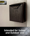 Mailbox mounted with double-sided heavy-duty mounting strips and tape for walls and outdoor use, showing raindrops.