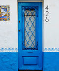 Blue door with house number showing 5 Inch Floating Stainless Steel Address Sign With Nail Kit For Outdoors Black Sign For Doors Walls Fences Mailboxes Anti Rust Zinc Alloy Durable Modern House Plaque Easy Install DIY Friendly No Fuss on white wall.