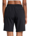 Back view of Women's Hiking Shorts With 8 Inch Inseam, Lightweight Quick Dry Fabric, Built In Pockets, Ideal For Running And Golf, Black, Size Large