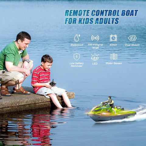 Father and son playing with green Kids RC Boat With LED Lights, Self Righting Jet Ski, 2.4GHz Remote Control For Ages 6 And Up.