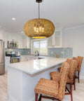 Large 22.83 Inch Rattan Boho Chandelier With Hand Woven Wicker, 4 Light Pendant Ceiling Fixture in a modern kitchen setting