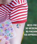 Child's arm wearing Mosquito Bite Relief Patch For Kids With Aloe And Witch Hazel Fast Itch Relief Hydrocolloid Insect Bite Treatment.