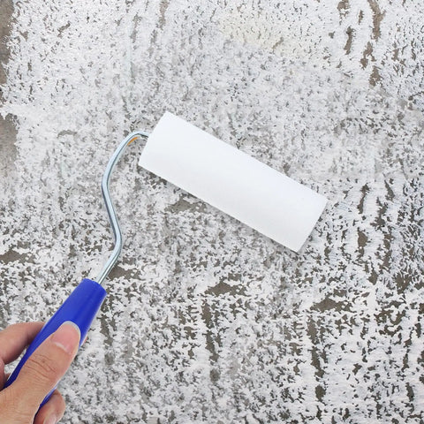 Heavy Duty Paint Roller Covers With Frame for Crisp Wall And Edge Painting Smooth Operator Handle Grip Easy Control Tool for DIY Projects in use on a painted surface.