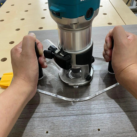 Game Changing Clear Acrylic Router Base Plate Compatible With RT0701C And XTR01Z 6 By 10 Inch Wide Base shown in use with dual grip handle.