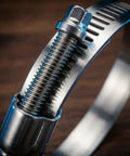 Close-up of 30Pcs 304 Stainless Steel Hose Clamps Set With 6-51mm Adjustable Worm Gear Clamps, showing interlocking design details.