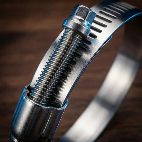 Close-up of 30Pcs 304 Stainless Steel Hose Clamps Set With 6-51mm Adjustable Worm Gear Clamps, showing interlocking design details.