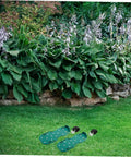 Adjustable Lawn Aerator Shoes With Durable Metal Spikes Easy Assembly 8 Pcs Garden Care Gear on lawn with plants