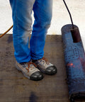 Rugged Steel Toe Covers For Boots And Shoes, Tough-As-Nails Toe Caps on worker's boots, protects against impacts, construction use