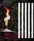 Long Life Fiberglass Torch Wicks 10 Inch Replacement Wicks For Tiki Torches And Oil Lamps, shown unused beside a lit torch