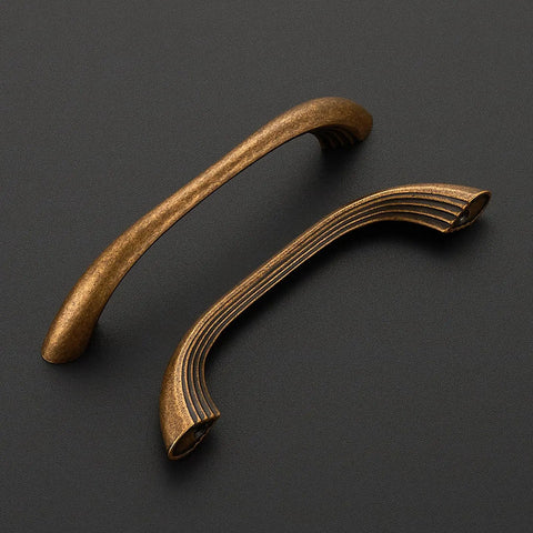 10 Pack Antique Brass Cabinet Pulls With Ergonomic Curved Grip For 5 Inch Kitchen Cabinets And Drawers Modern Layered Detailing