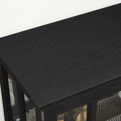 Close-up of black top surface of 30 Inch Glass Curio Display Cabinet With LED Lighting Modern Two Lattice Doors.