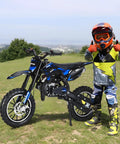 Awesome 50Cc Gas-Powered Kids Dirt Bike With 2-Stroke Engine Hits 35 Mph shown with young rider giving thumbs up outdoors.