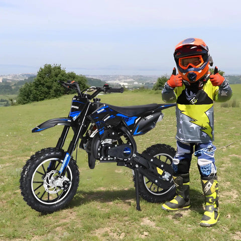 Awesome 50Cc Gas-Powered Kids Dirt Bike With 2-Stroke Engine Hits 35 Mph shown with young rider giving thumbs up outdoors.