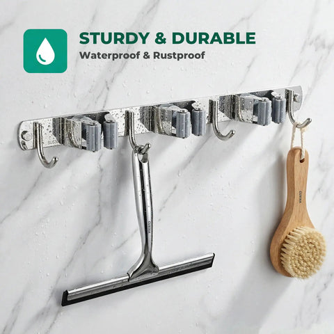 Stainless Steel Broom And Mop Wall Mount Organizer With Three Racks And Four Hooks Heavy Duty Space Saver Easy Install displayed.