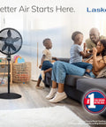 Family in living room with Oscillating Cyclone Pedestal Fan With Remote, Adjustable Height Up To 54 Inches, 18-Inch Black Standing Fan