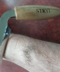 Pro Grade Dual Handle Draw Knife Sporting A Killer Razor Edge And Sweet Grip with oak handle shown on a hand.