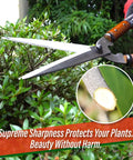 Pro Grade Hedge Shears 22.6 Inch For Precise Hedge Trimming And Shaping in use, cutting shrub branch, silver blades, ergonomic handle