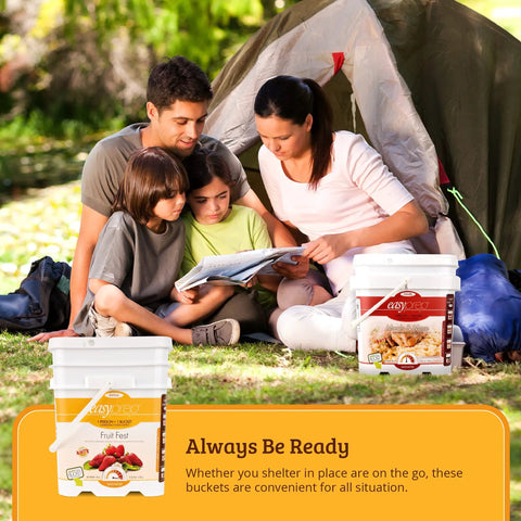 Family reading by tent with Fruit Fest Freeze Dried Fruit Variety Kit for Emergency Food Storage buckets on the ground.