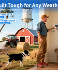 Person using Long-Range Wireless Automatic Water Level Controller for Tank, Well and Cistern in farm setting, dog nearby