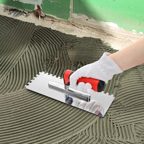 Hand using Three Piece Concrete Trowel Set With Stainless Steel Square Notched And Flat Finishing Trowels for tile cement work