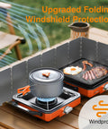 Kickass Two Burner Propane Camping Stove With Windproof Shield Portable Folding Gas Burner Road Trip Ready with cooking pan and food.
