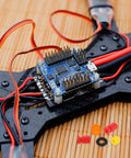 M3 Rubber Flat Washer 6mm OD 3mm ID 1mm Thick Anti Vibration Gasket for RC Flight Controllers And Drones with connectors visible