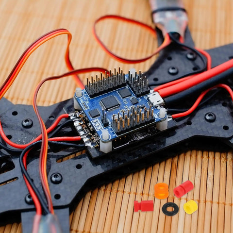 M3 Rubber Flat Washer 6mm OD 3mm ID 1mm Thick Anti Vibration Gasket for RC Flight Controllers And Drones with connectors visible