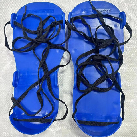 Top view of Lawn Aerator Shoes For Home Improvement, Durable PP Ground Spikes Footwear With Non Slip Design in blue color.
