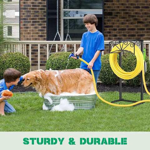 Heavy Duty Garden Hose Holder With 4 Ground Spikes next to boy washing dog in yard, sturdy metal stand holding yellow hose