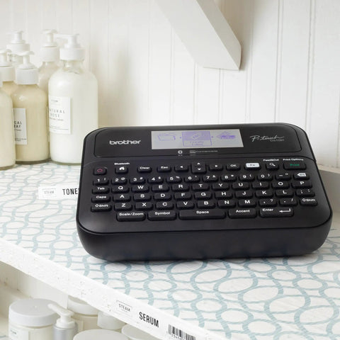 P Touch PT D610BT Label Maker With Bluetooth And USB Pro Grade Connected Label Printer on a shelf with skincare products