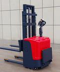Commercial Electric Pallet Stacker Heavy Duty Warehouse Forklift Built Tough Design showing red chassis and adjustable forks.