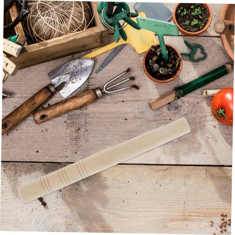 Durable Garden Sickle Handle Replacement With Solid Wood Grip For Easy Weeding And Harvesting Pro Grade Versatile Tool For Home Gardeners And Pros Simple Install And Dependable Performance lies on a wooden table among gardening tools.