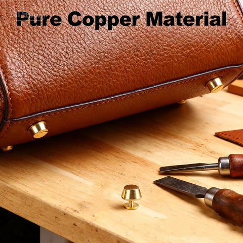 Top Shelf Solid Brass Nailhead Studs With A Killer Gold Shine Featuring No Fuss Flat Head Screw Back Rivets Made For Heavy Duty Leather Handbag Fixes And Smooth Diy Craft Projects That Truly Deliver on a brown leather bag with tools.