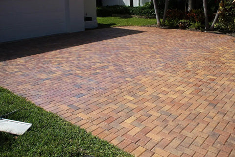 Premium Two Part Urethane Paver Sealer That Kicks Up Rich Outdoor Stone Color And Shields Concrete Patios With A Durable Semi Gloss Protective Finish That Goes The Distance on a driveway.