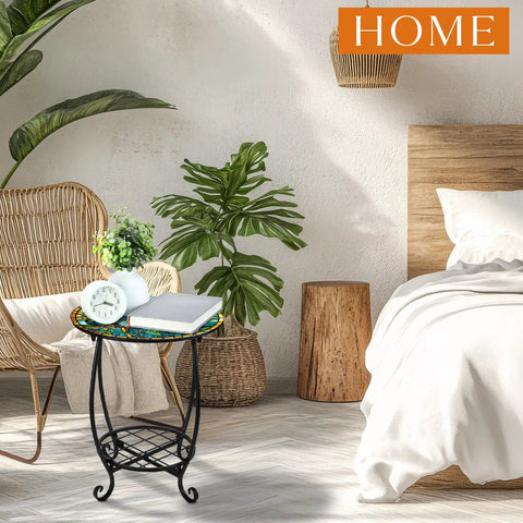Outdoor Round Side Table 14 Inch Mosaic Butterfly Style Patio Accent Table in bedroom, next to bed and armchair.