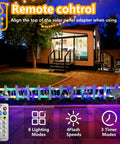 Outdoor Solar Powered Rope Lights 132 Ft Twin Pack 400 LED Lit Color Changing Fairy Lights Waterproof IP65 With Remote for Christmas Garden Pool Trampoline Lawn Decor illuminated along a garden fence.
