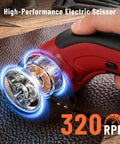 Katerk 4.4V Cordless Electric Scissors & Cardboard Cutter With 2pcs Blades cutting leather with visible motor details.