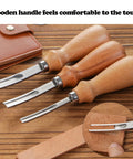 Pro Grade Leather Edge Trimming Bevel Tool Set Four Piece With French Bevel Knife and wooden handles on wooden surface