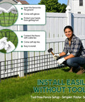 Woman installing No Dig Garden Fence Panels For Outdoor Yard, 30 Rustproof Metal Barriers, 42.5 Feet Long By 13 Inches High.