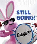 Energizer's pink bunny mascot wearing sunglasses, holding a drum, promoting steady power and reliability.