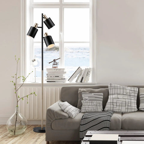 Lexie 67 Inch Floor Lamp With 3 Pivoting Heads In Matte White Finish And Antique Brass Accents Modern Glam Vibe in a living room setting