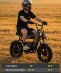 Rider on R6mini 1000W Fat Tire Electric Bike With Front Light And Bluetooth Speaker in golden field