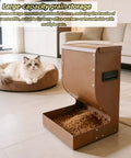 Heavy Duty Outdoor Dog Automatic Feeder 15 Pound Large Capacity All Weather Shell with kibble storage and a cat nearby.