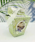 Decorative gift box crafted with Milk Box Gift Box Die Cut Set For Paper Craft And Scrapbooking, adorned with ribbons and butterflies.