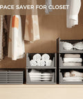 Stackable Plastic Storage Baskets 2 Pack Foldable Closet Organizers And Storage Bins in wardrobe with towels and clothes.