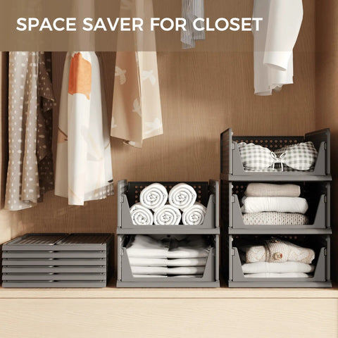 Stackable Plastic Storage Baskets 2 Pack Foldable Closet Organizers And Storage Bins in wardrobe with towels and clothes.