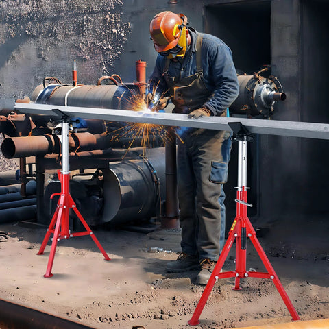 Pipe jack stands, red steel, adjustable height, front view supporting a welded metal pipe in factory setting