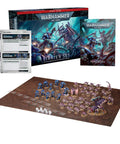 Warhammer 40,000 Starter Set With 38 Push Fit Miniatures Two Balanced Armies Basic Rules Dice Gaming Mat Reference Sheets And Range Rulers For Quick Beginner Friendly Battles Right Out Of The Box displayed with components